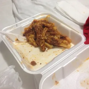 Half eaten but perfect chili cheese fries.