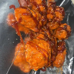 a close up of the chicken wings
