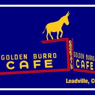 a donkey on top of a sign