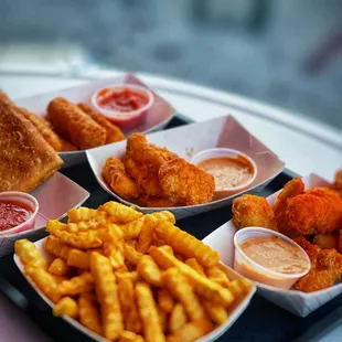 pizza pouch, fries, mozz sticks and nuggs