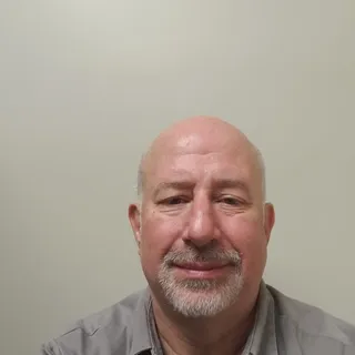 Mark E.