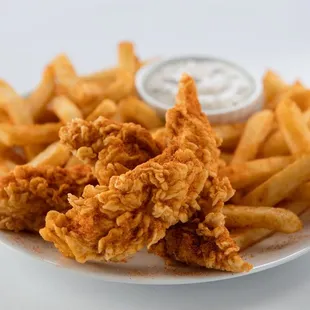 a plate of fried chicken and french fries