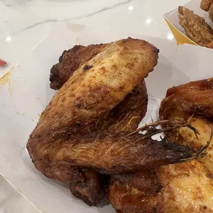 Terrible food and service!  Uncooked chicken and feathers still cooked on Chicken.