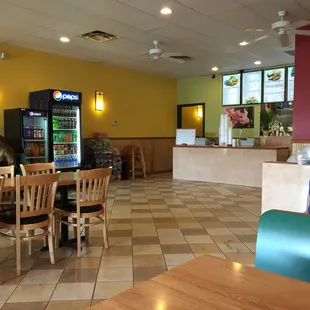 Take out style with indoor tables.