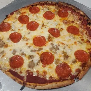 Try a pizza from Golden Chicken