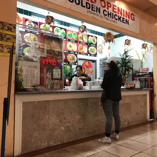a person standing in front of a counter