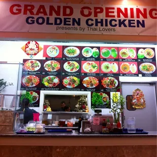 Store front with new menu pictures.