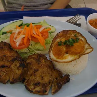 Grilled boneless porkchop. Generous portion.