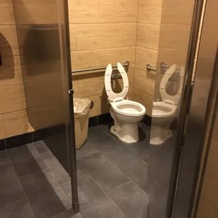 a toilet and a shower stall