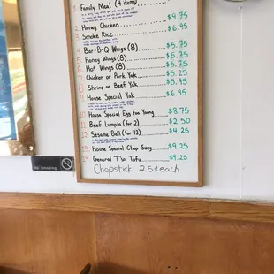 a menu on the wall of a restaurant