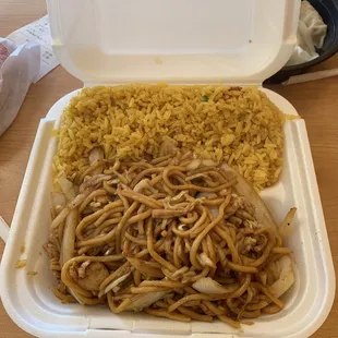 a container of noodles and meat