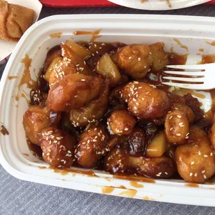 a plate of chicken and rice