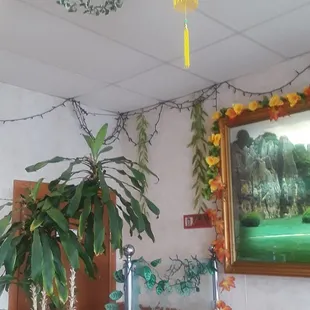 a red chinese lantern hanging from the ceiling