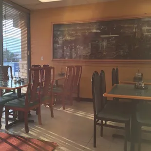 The dining room with a cool picture