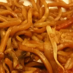 a plate of noodles and shrimp