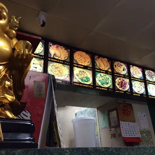 a statue of a laughing buddha