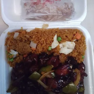Bourbon Chicken Combination Plate with Chicken Fried Rice and Egg Roll.