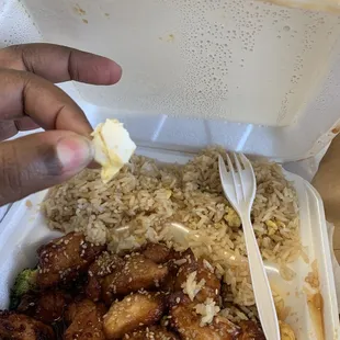Sesame chicken with fried rice. Had egg shell in food