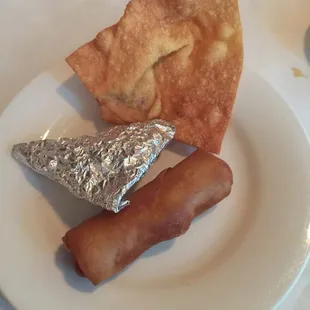 Egg roll chicken wrap and wonton all come with dinner along with soup and salad
