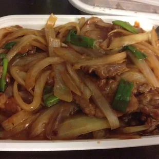 Mongolian beef. More like a container full of onions. That's literally all there was, white onion slivers and green onions in sauce.