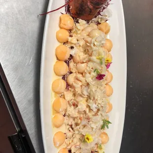 a plate of seafood and rice