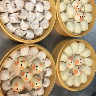 three bowls of steamed dumplings