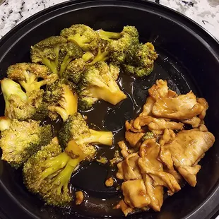 Pint size broccoli and a scoop of some chicken.