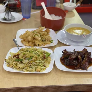 three plates of food on a table