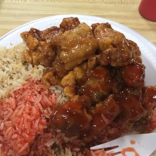 Orange chicken w some very tasty sweet and sour sauce dumped on it.