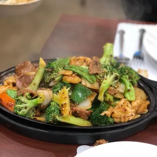 Sizzling Shrimp, Beef, and Chicken.