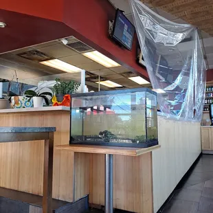a fish tank in a restaurant
