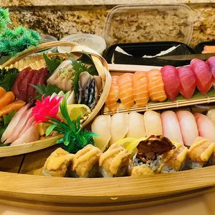 a variety of sushi in a boat