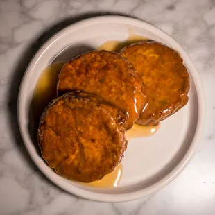 Pork egg foo young.  Ordered as takeout.  Plated and photographed at home.