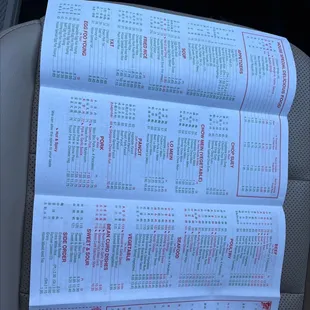 a menu in the back of a car