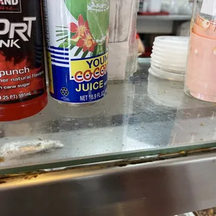 Dirty, nasty glass counter in front. Looks like it never been cleaned in....forever?