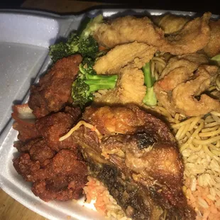 chicken, broccoli, and noodles in a styrofoam container