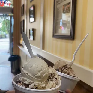 two bowls of ice cream with spoons