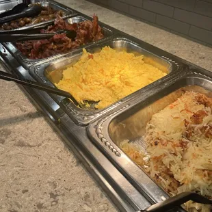 Hash browns, eggs, and bacon.