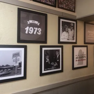 a variety of framed photos