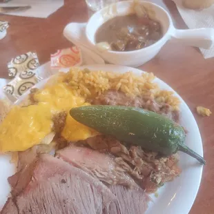 Rice beans chili and roast beef nachos nacho cheese