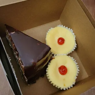 White chocolate mousse cake slice and mini cheesecakes