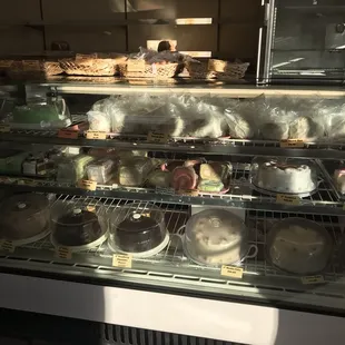 a display of cakes and pastries