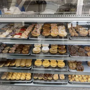 a display case full of donuts