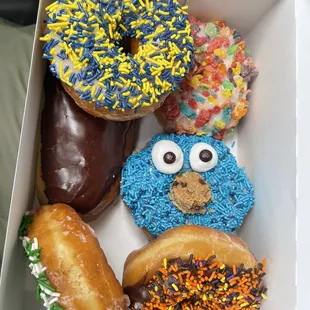 a variety of donuts in a box