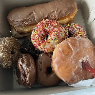 a variety of donuts in a box