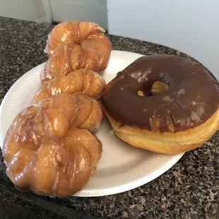 a variety of donuts on a plate