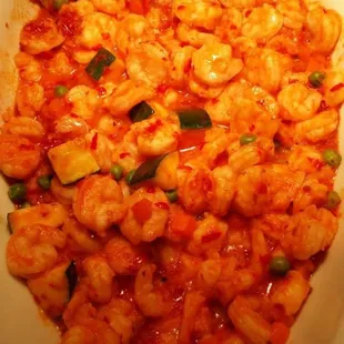 a bowl of shrimp and pasta