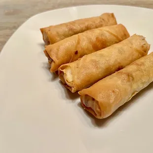 Egg Rolls. Golden crispy wrapper filled with vegetables. Nicely done. It comes with a sweet and sour sauce.