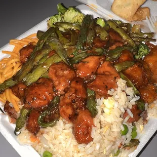 a take out box of chinese food