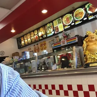 a man sitting at a restaurant counter